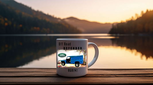 Mug with Land Rover Defender design on a wooden dock by a lake at sunset