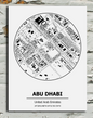 Map of Abu Dhabi on a white background against a textured gray wall.