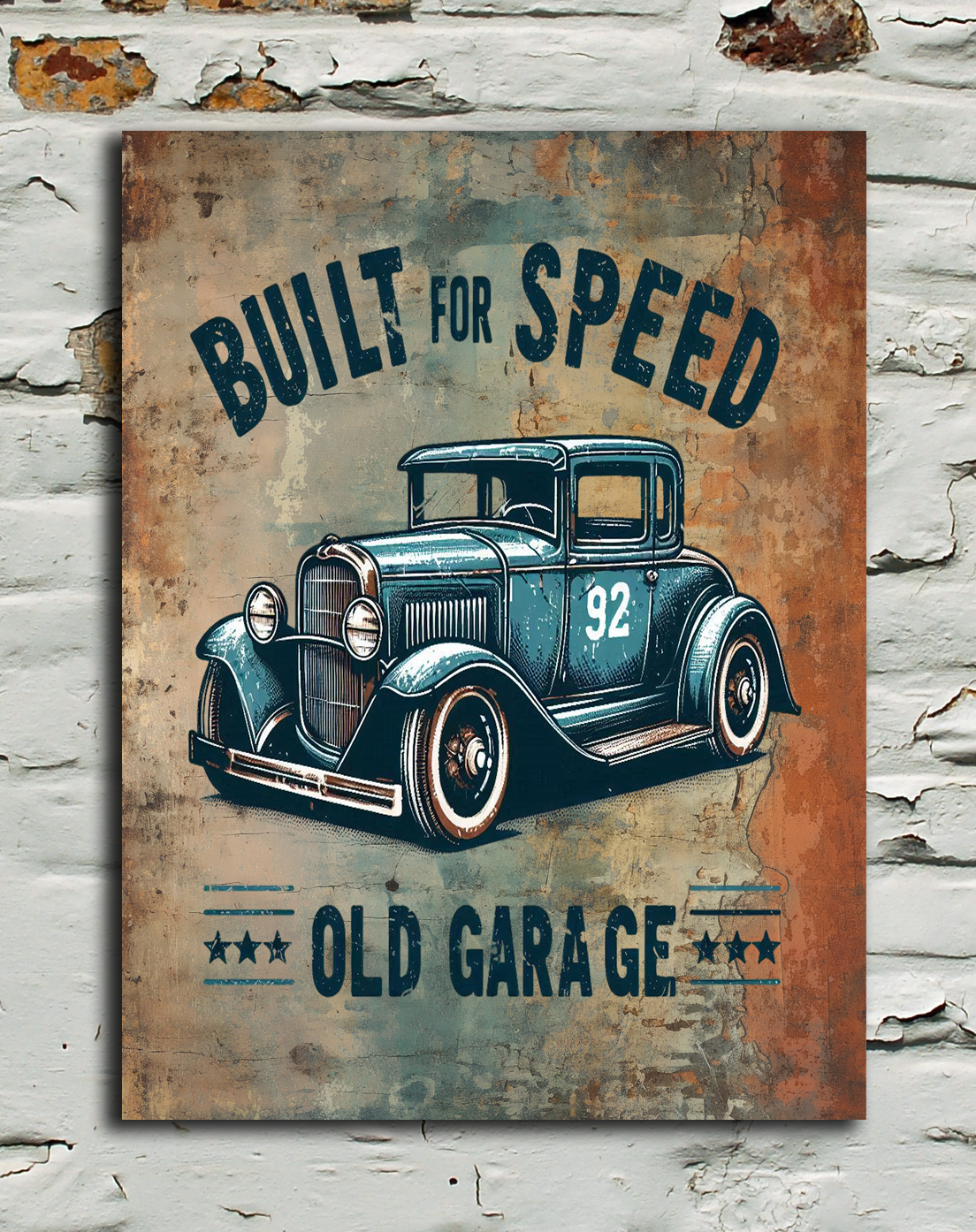 A rectangular vintage-style metal wall art print hanging on a distressed white brick wall. The print features an illustration of a blue classic car with the text 'BUILT FOR SPEED' above it and 'OLD GARAGE' below it.