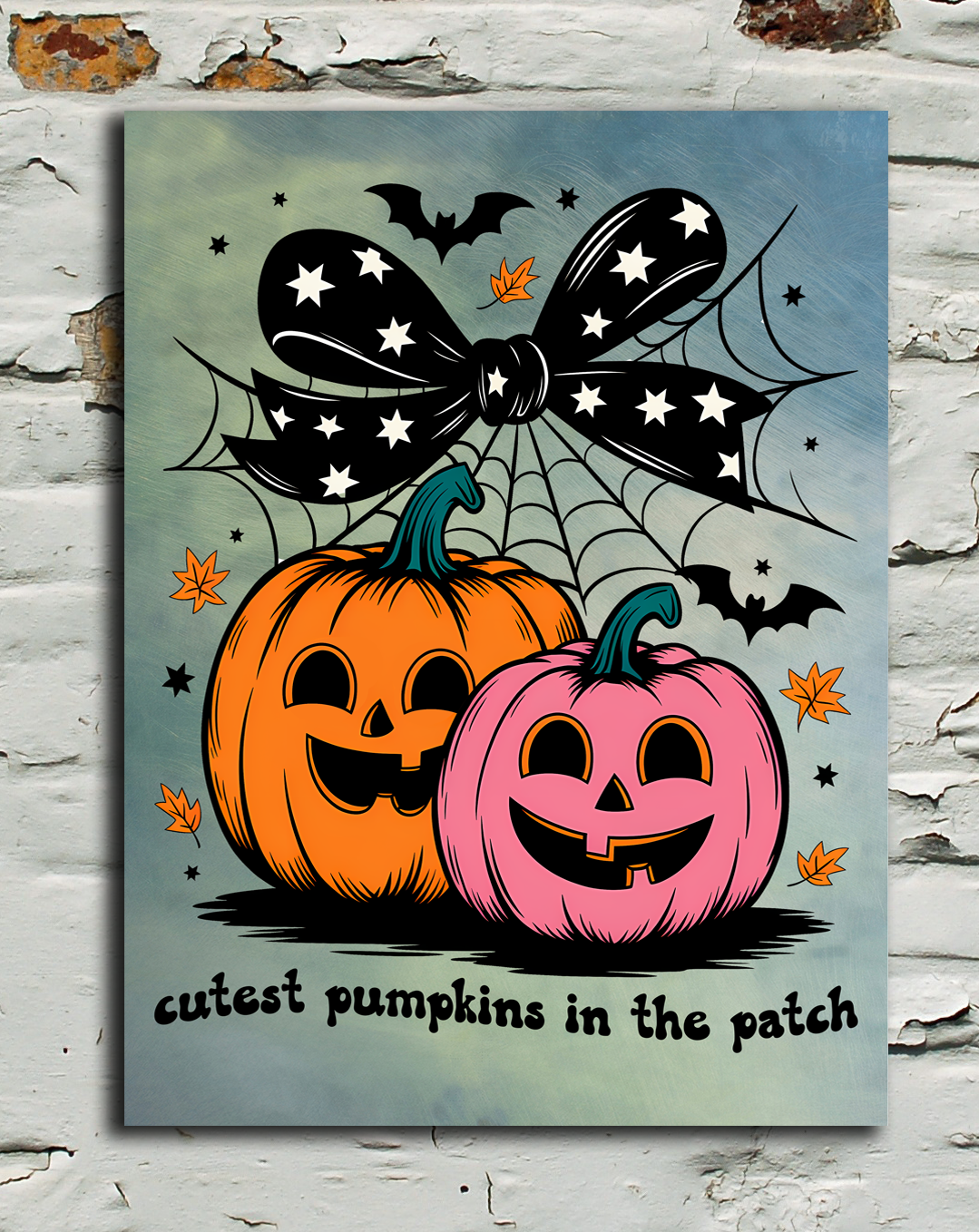 A rectangular wall art print featuring two smiling jack-o'-lantern pumpkins under a black spiderweb and bow, displayed against a distressed white brick wall.