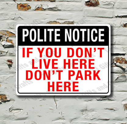A rectangular warning sign with a black, white, and red design reading 'POLITE NOTICE IF YOU DON'T LIVE HERE DON'T PARK HERE', displayed against a distressed white brick wall.
