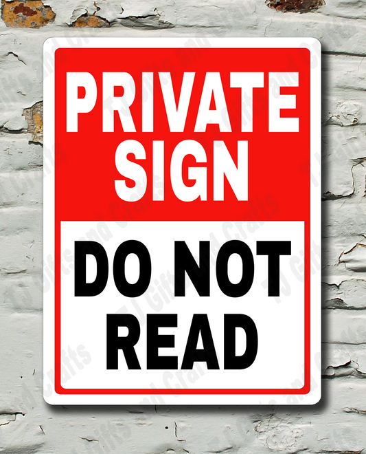 A rectangular warning sign with a red top section reading 'PRIVATE SIGN' in white text and a white bottom section reading 'DO NOT READ' in black text, mounted against a distressed white brick wall.