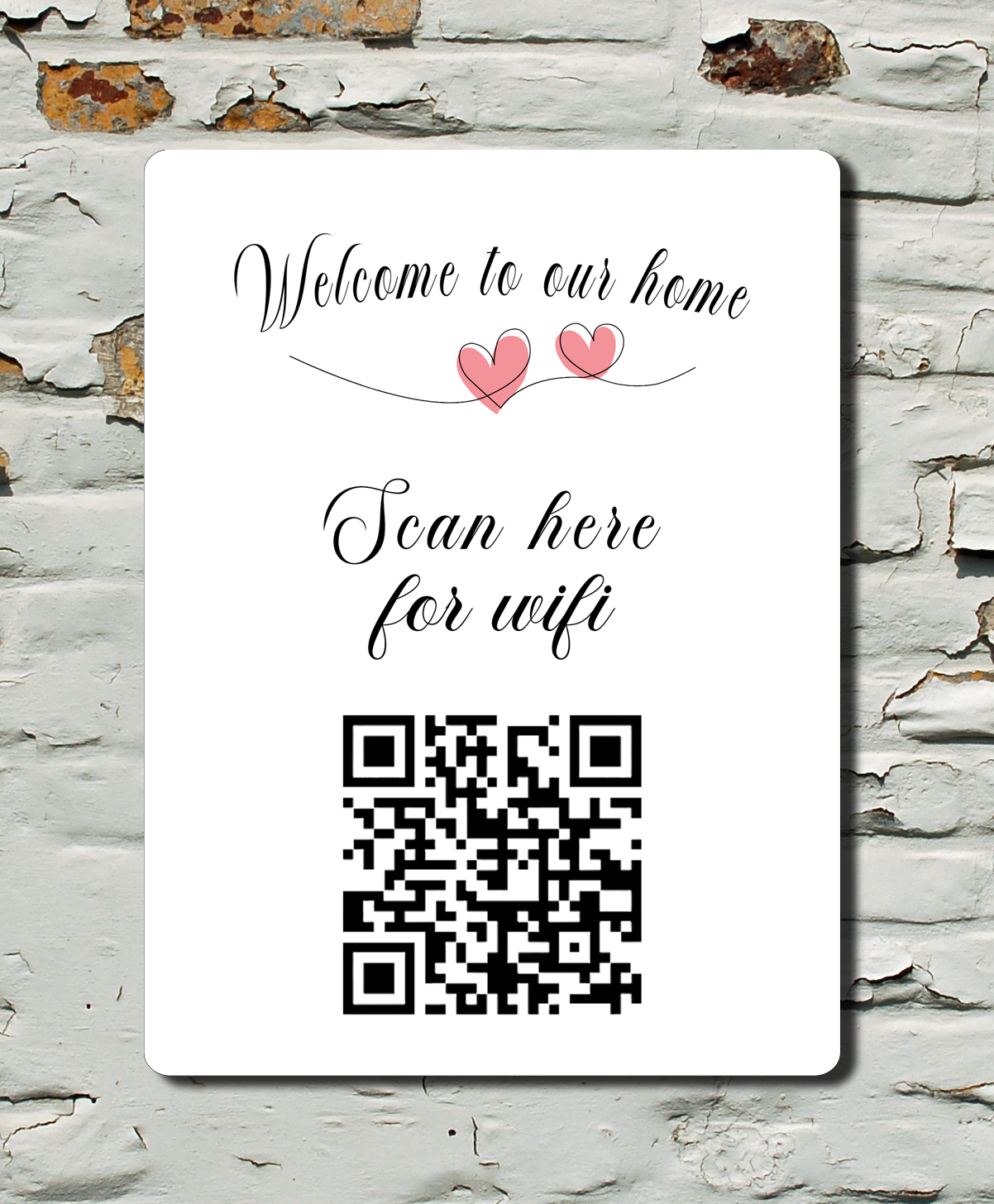 WiFi QR code sign on a textured wall with 'Welcome to our home' text