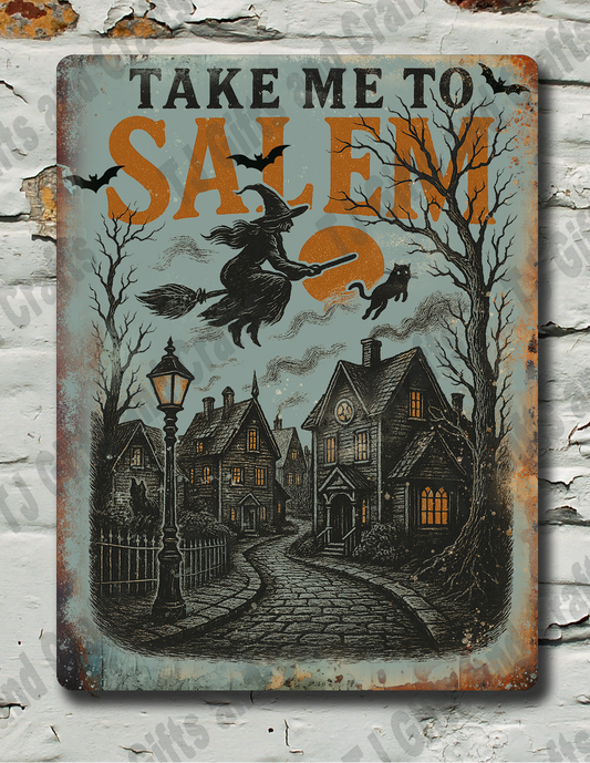 A rectangular vintage-style metal sign with a Halloween illustration and the text 'TAKE ME TO SALEM' hangs on a distressed white brick wall.
